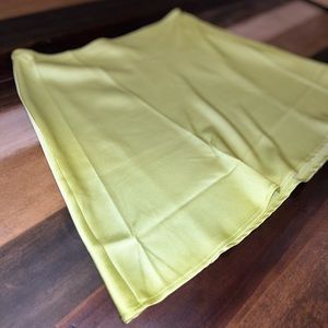 Green satin mini skirt